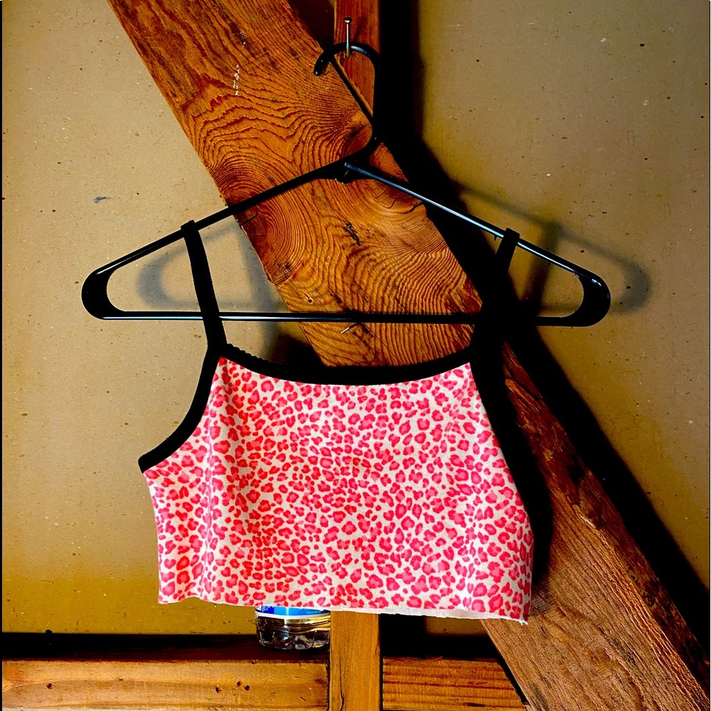 Pink cheetah crop top shirt from Brandy Melville